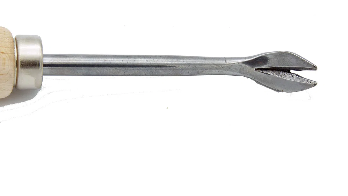 Desclavadora de doble punta, sacagrapas de acero para tapicería profesional.